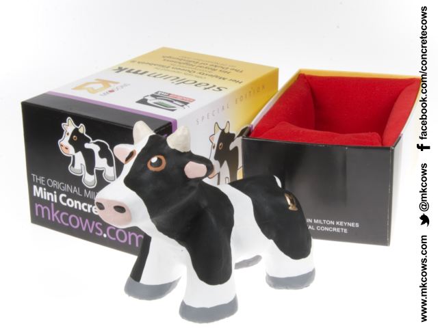The Queen is given a Mini Concrete Cow as she opens the Mk Dons Stadium MK.